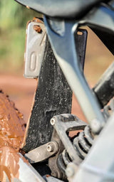 Sur-Ron OEM rear shock mud flap